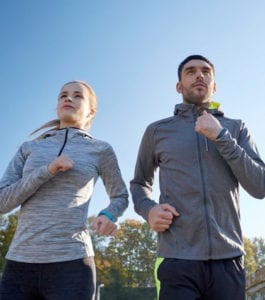 Young couple running